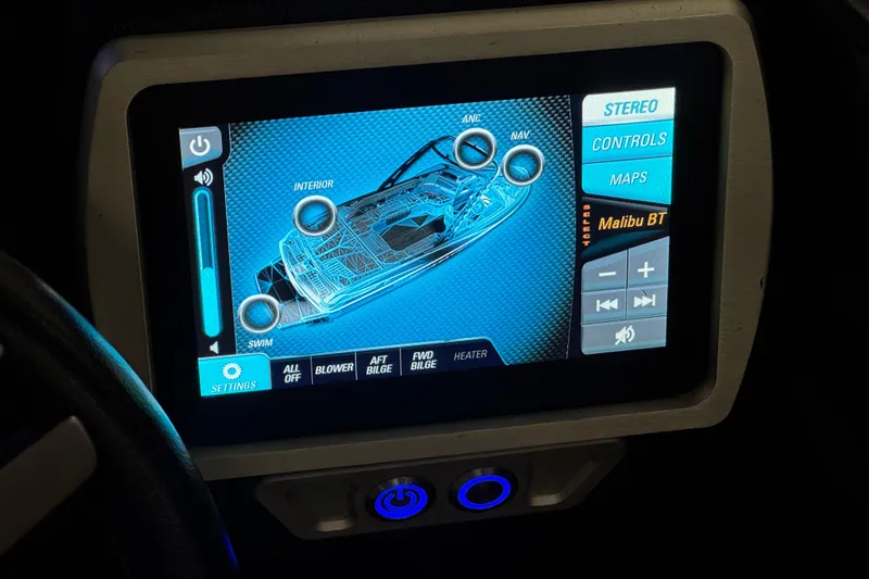 Slide: The Image of Touchscreen control panel of a 2015 Malibu Wakesetter 247 LSV boat. - 41