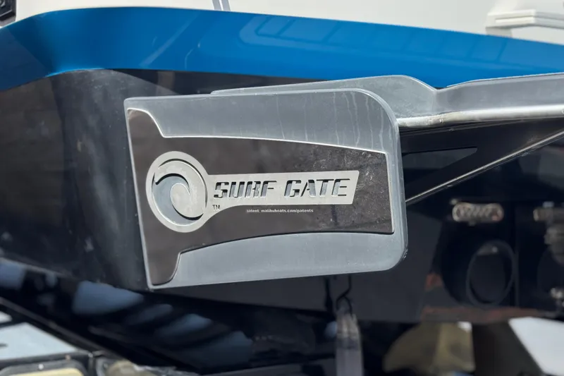 Slide: The Image of 2015 Malibu Wakesetter 247 LSV Surf Gate detail, showcasing innovative wakeboarding technology. - 9