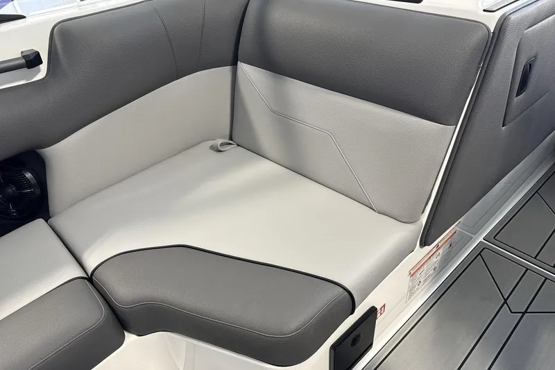 Slide: The Image of 2026 Moomba Max boat interior with sleek gray seating and modern design. - 17