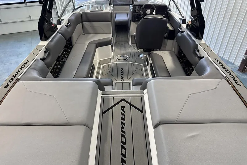 Slide: The Image of 2026 Moomba Max boat interior with spacious seating and modern design. - 9