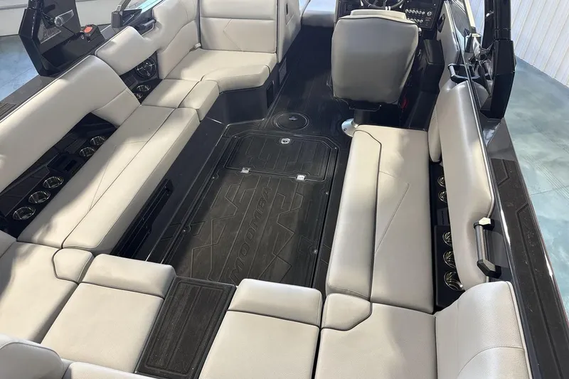 Slide: The Image of 2026 Moomba Tykon boat interior with spacious seating and modern design. - 10