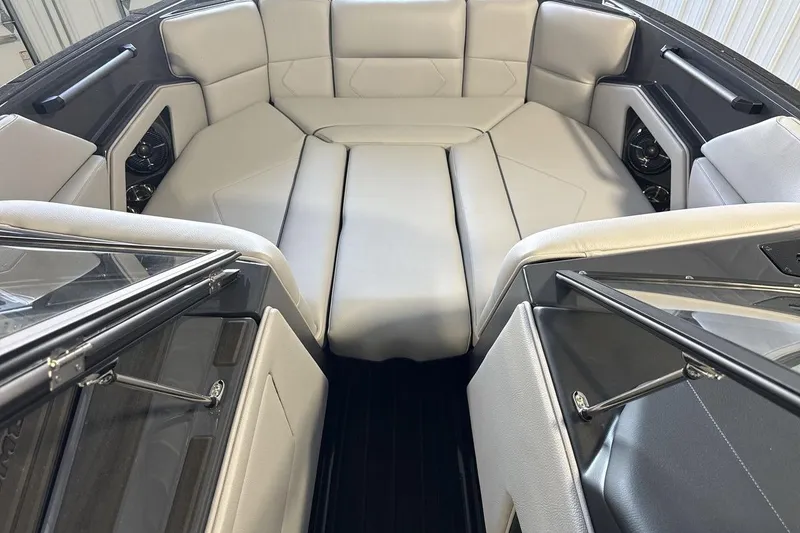 Slide: The Image of Luxurious interior of 2026 Moomba Tykon boat with plush seating and sleek design. - 11