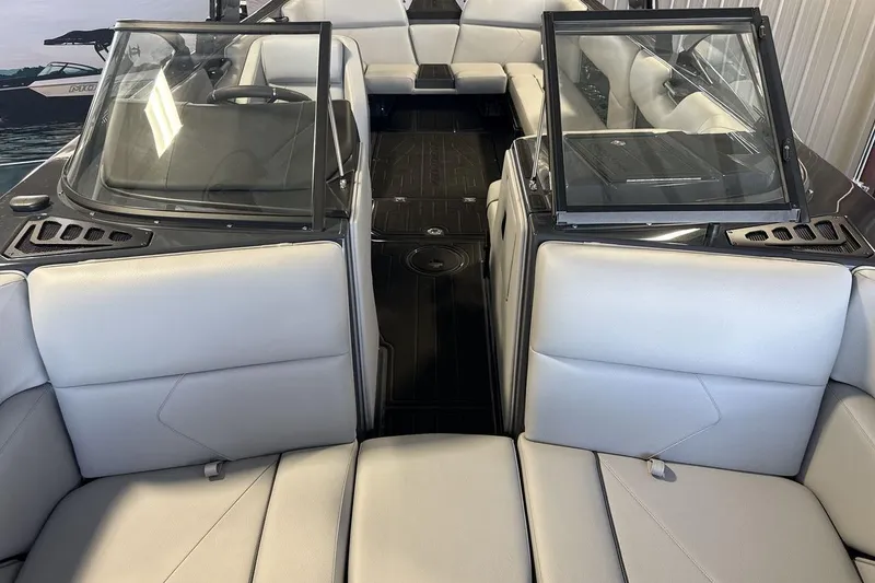 Slide: The Image of 2026 Moomba Tykon boat interior with sleek seating and modern design. - 12