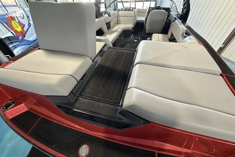 Slide: The Image of 2026 Moomba Tykon boat interior with spacious seating and modern design. - 19