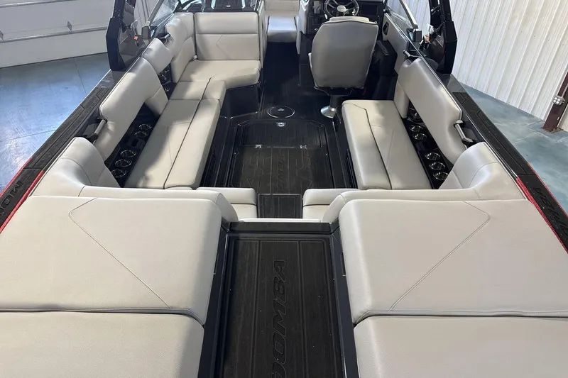 Slide: The Image of 2026 Moomba Tykon boat interior with spacious seating and modern design. - 9