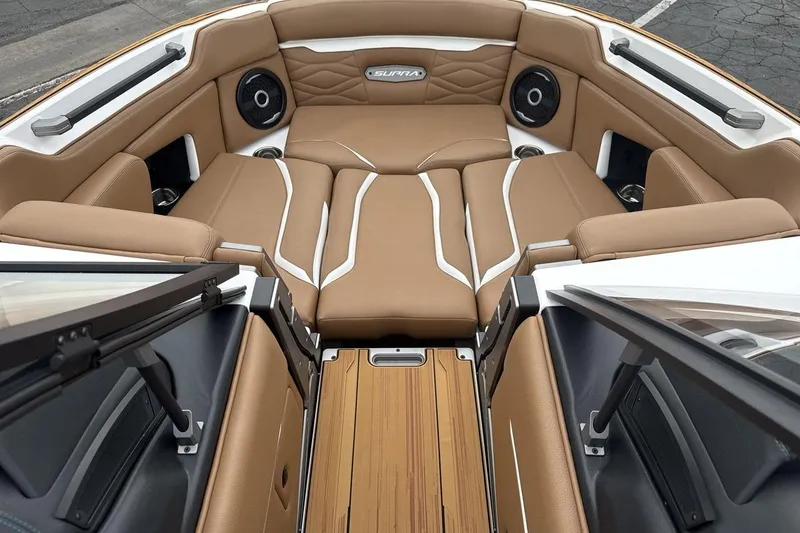 Slide: The Image of Luxurious interior of 2026 Supra SV boat with tan leather seating and premium sound system. - 11