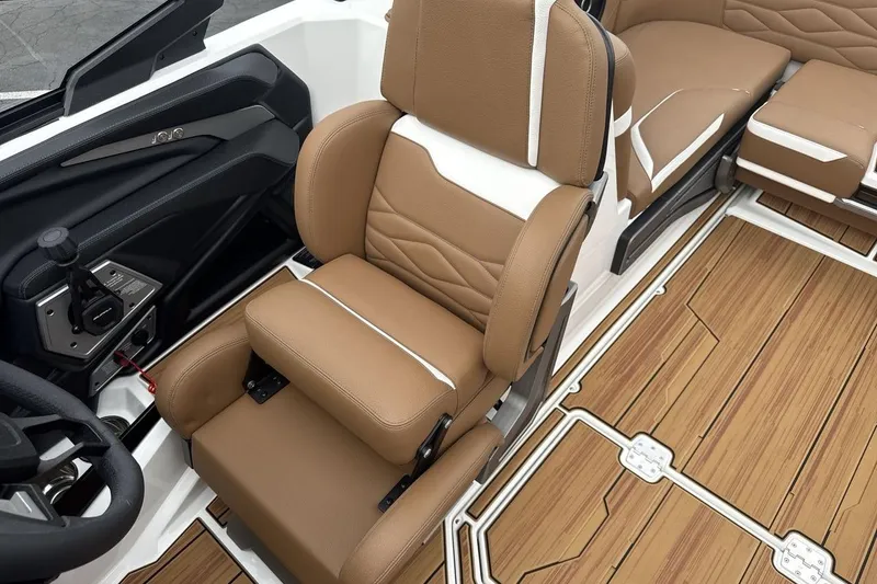Slide: The Image of 2026 Supra SV interior with tan leather seats and wood-style flooring. - 13