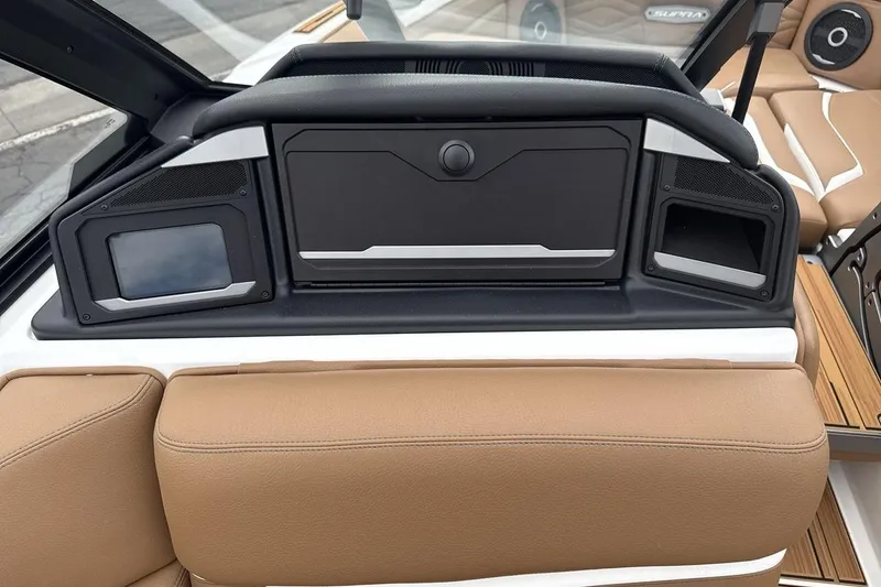 Slide: The Image of 2026 Supra SV boat interior with modern dashboard and tan leather seating. - 18