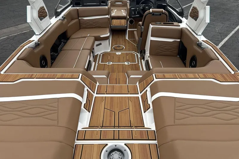 Slide: The Image of Luxurious 2026 Supra SV boat interior with tan leather seating and elegant wood flooring. - 9