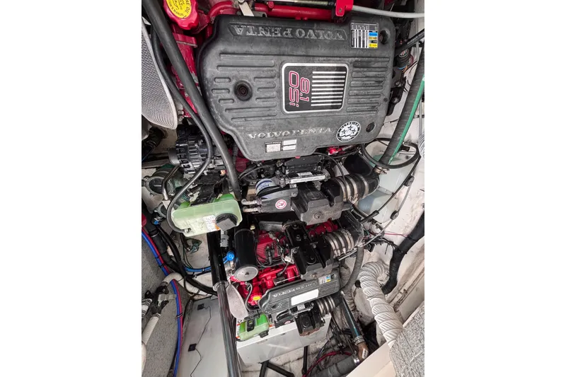 Slide: The Image of Engine compartment of a 2007 Rinker EX 370 with Volvo Penta components. - 26