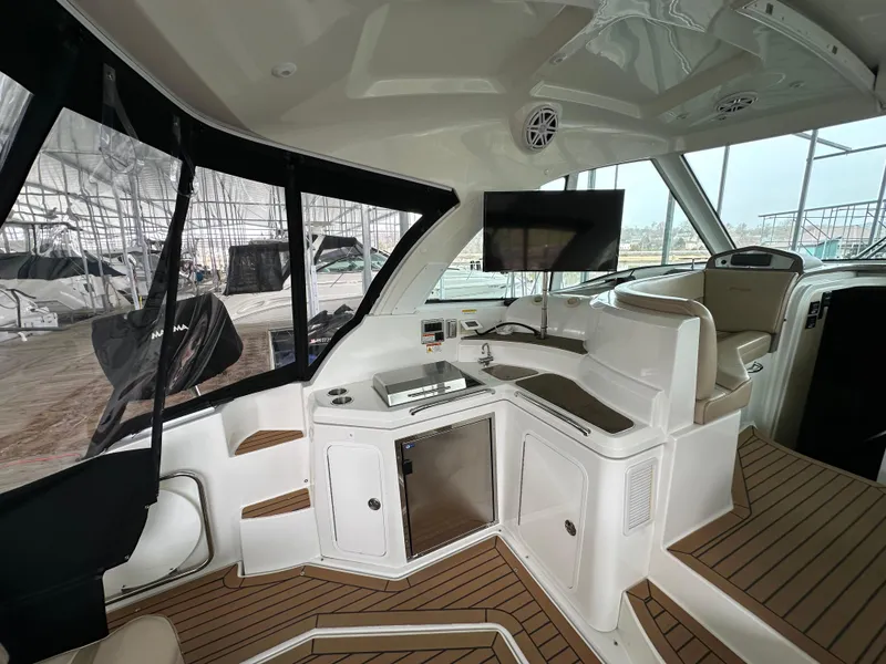 Slide: The Image of 2009 Cruisers Yachts 420 Sports Coupe interior with modern amenities and sleek design. - 21
