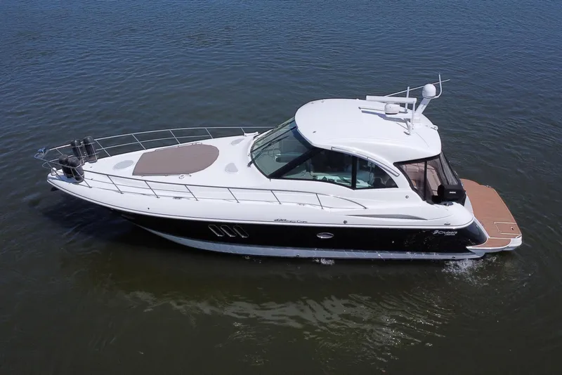 Slide: The Image of 2009 Cruisers Yachts 420 Sports Coupe on calm water, aerial view. - 6