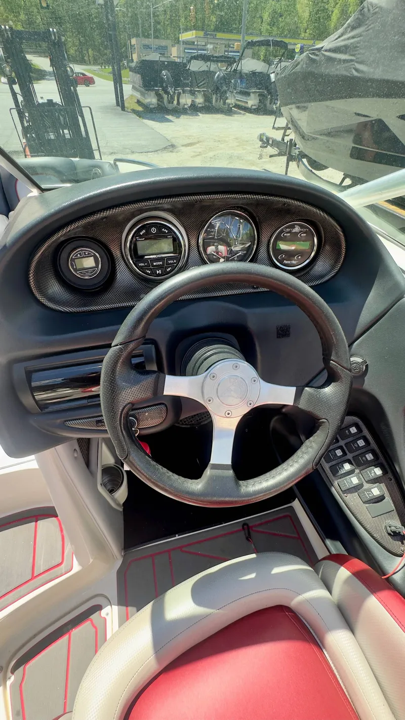Slide: The Image of Steering wheel and dashboard of a 2005 Centurion Avalanche C4. - 11