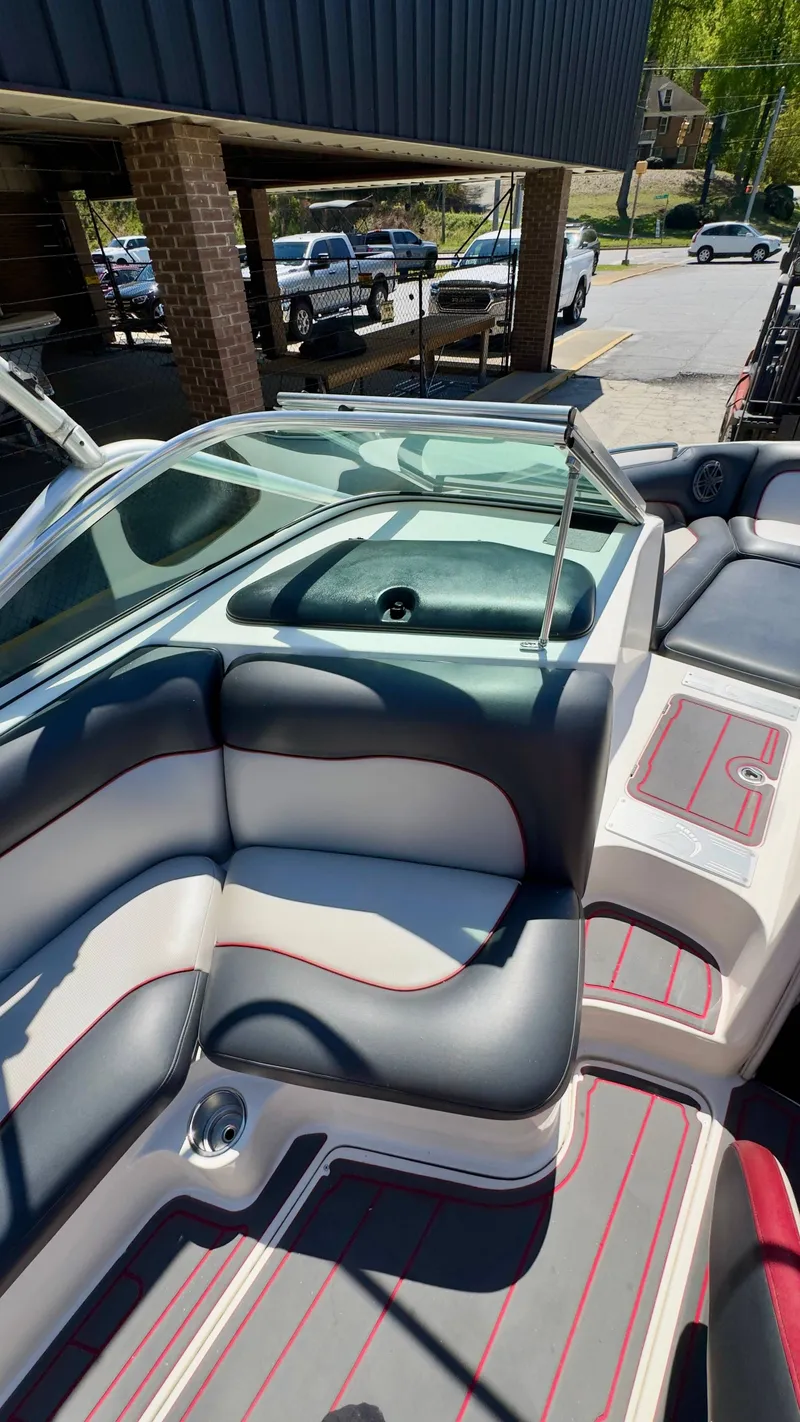 Slide: The Image of Interior of a 2005 Centurion Avalanche C4 boat with gray and red seating. - 13