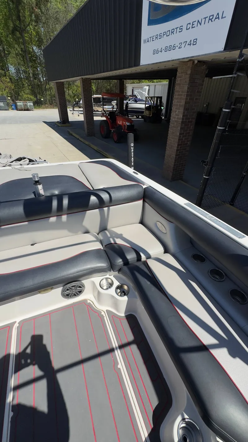 Slide: The Image of Interior of a 2005 Centurion Avalanche C4 boat at watersports center. - 14