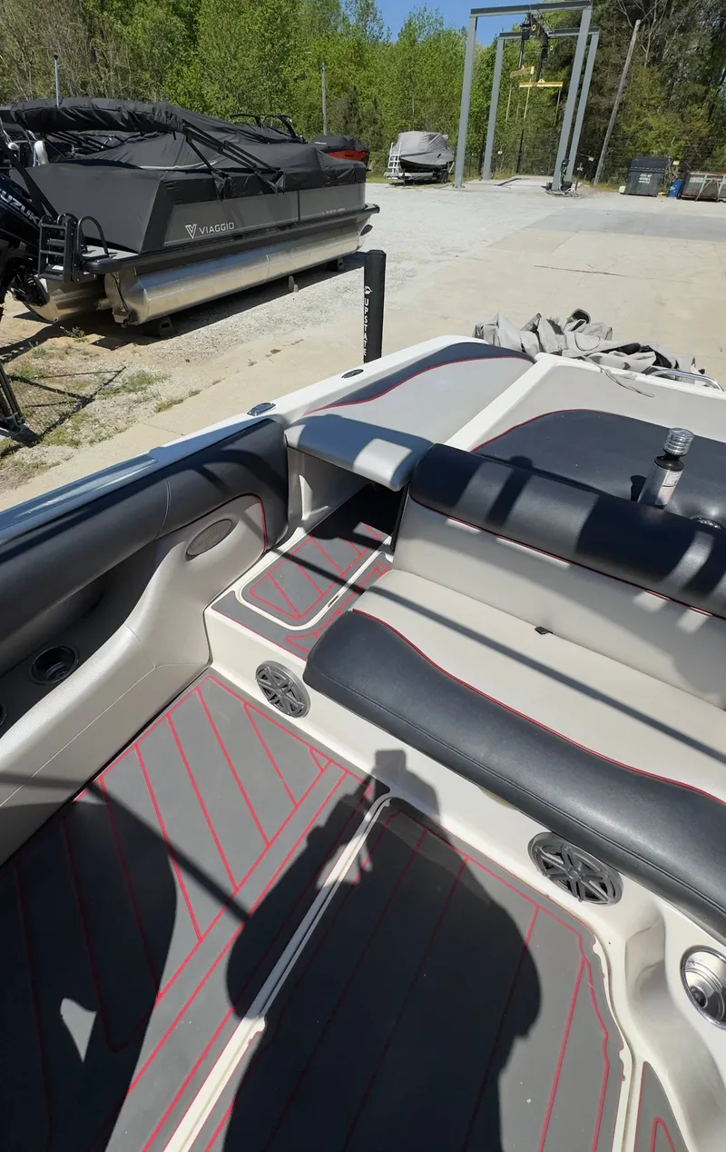 Slide: The Image of Interior of a 2005 Centurion Avalanche C4 boat with gray and red accents. - 16