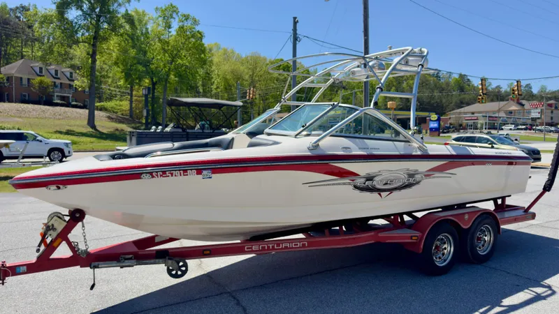 Slide: The Image of 2005 Centurion Avalanche C4 boat on trailer, side view. - 3