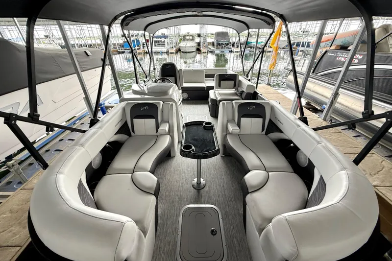 Slide: The Image of 2023 Barletta Corsa 23U pontoon boat interior with luxurious seating and sleek design. - 25