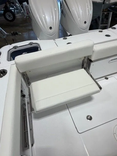 Slide: The Image of Everglades 285 Center Console 2026 with white seating area. - 11