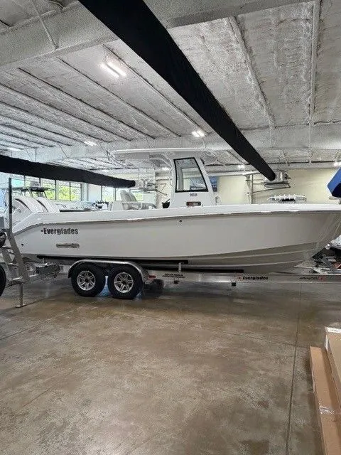 Slide: The Image of 2026 Everglades 285 Center Console boat in warehouse. - 13