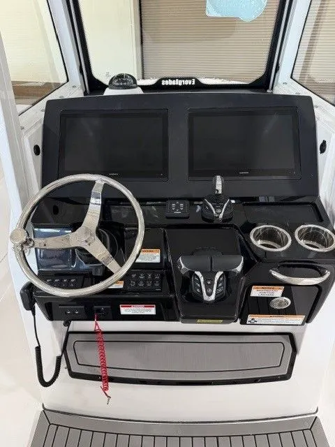 Slide: The Image of 2026 Everglades 285 Center Console helm with dual displays. - 20