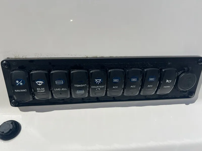 Slide: The Image of Switch panel of a 2026 Key West 189 FS boat. - 4