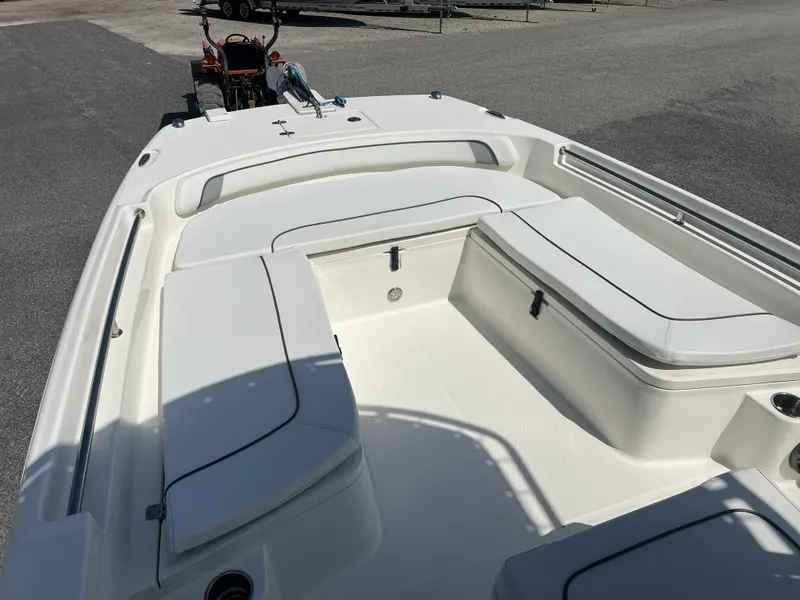 Slide: The Image of 2015 Carolina Cat 23CC boat with white interior. - 11
