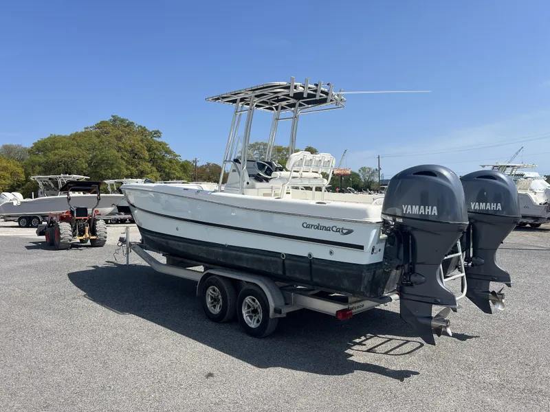 Slide: The Image of 2015 Carolina Cat 23CC boat with Yamaha engines on trailer. - 12