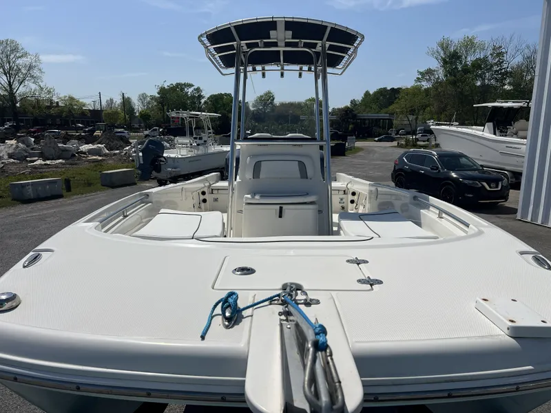 Slide: The Image of 2015 Carolina Cat 23CC boat in a parking lot. - 14