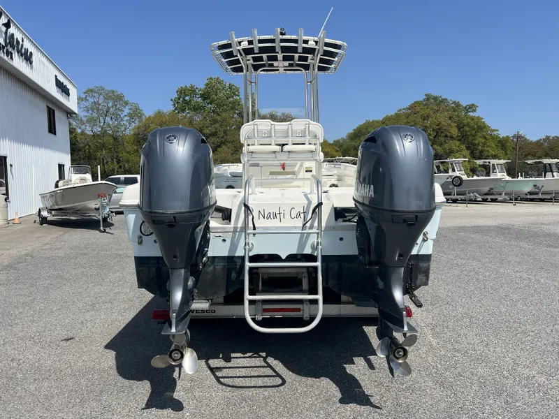 Slide: The Image of 2015 Carolina Cat 23CC boat with dual Yamaha outboard engines. - 6