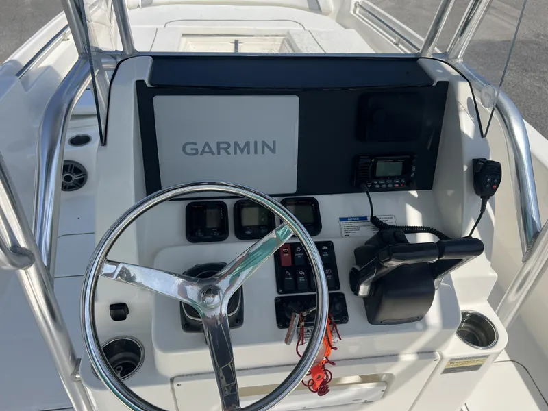 Slide: The Image of 2015 Carolina Cat 23CC helm with Garmin electronics. - 9