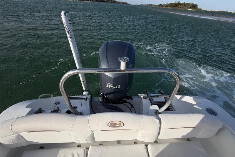 Slide: The Image of 2018 Sea Hunt Ultra 235 SE boat with Yamaha 250 engine on open water. - 51