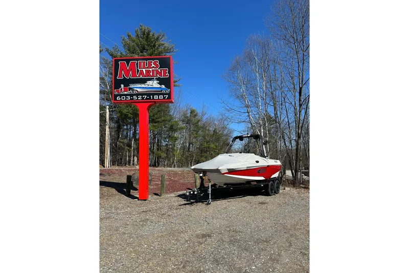 Slide: The Image of 2024 Axis A20 boat on trailer at Miles Marine dealership. - 25