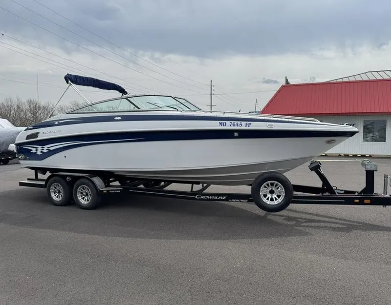 Slide: The Image of 2003 Crownline 270 BR boat on trailer, side view. - 13