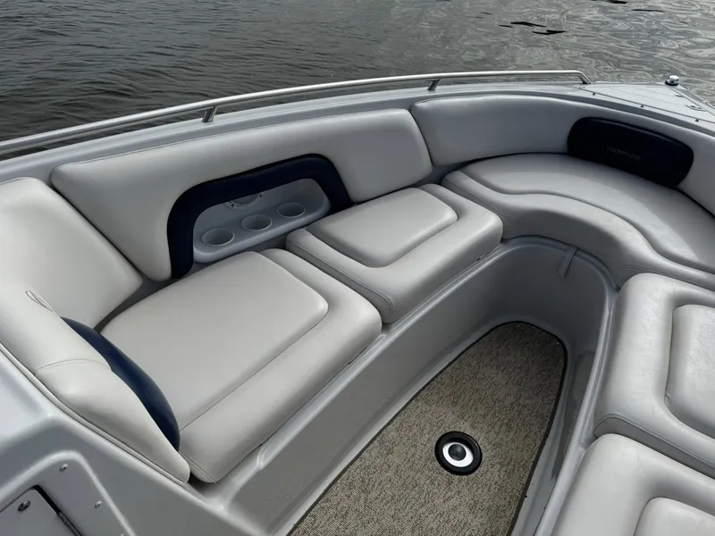 Slide: The Image of Interior of a 2003 Crownline 270 BR boat with gray upholstery. - 20