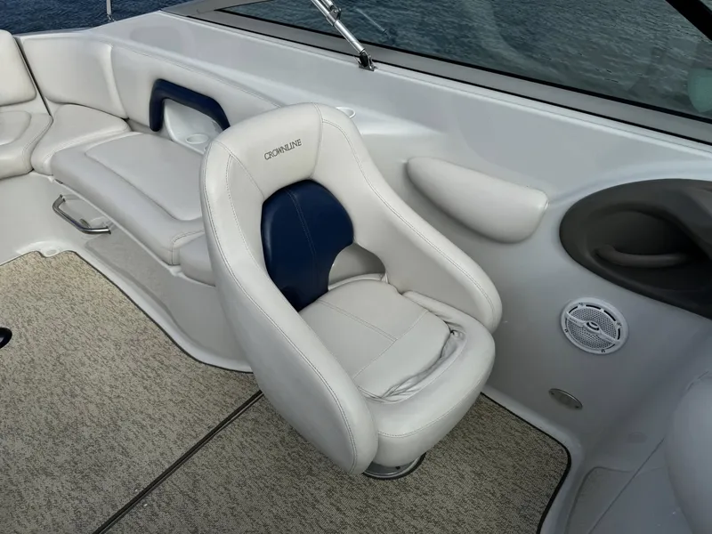 Slide: The Image of Interior of a 2003 Crownline 270 BR boat with white seating. - 25
