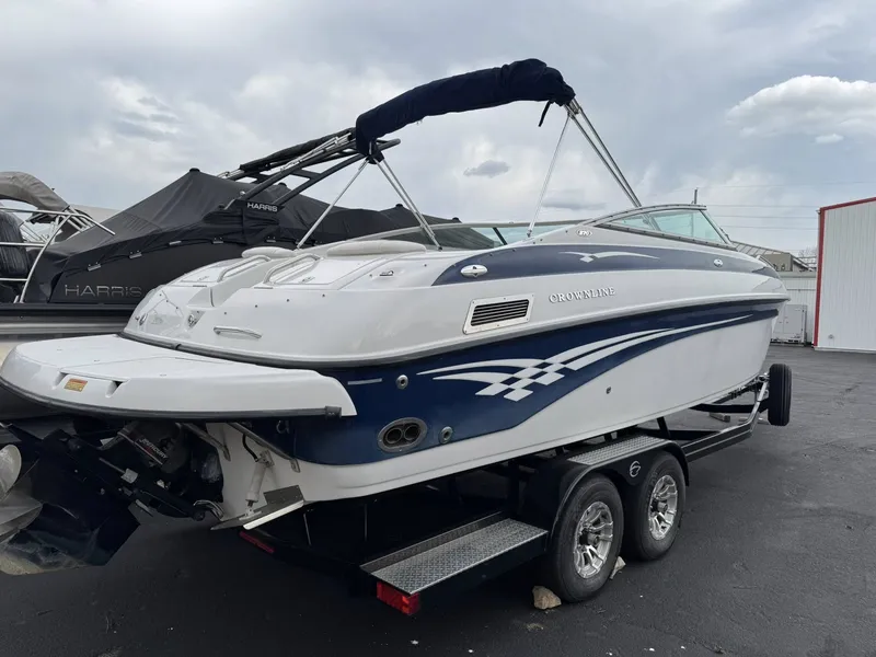 Slide: The Image of 2003 Crownline 270 BR boat on trailer, side view. - 3