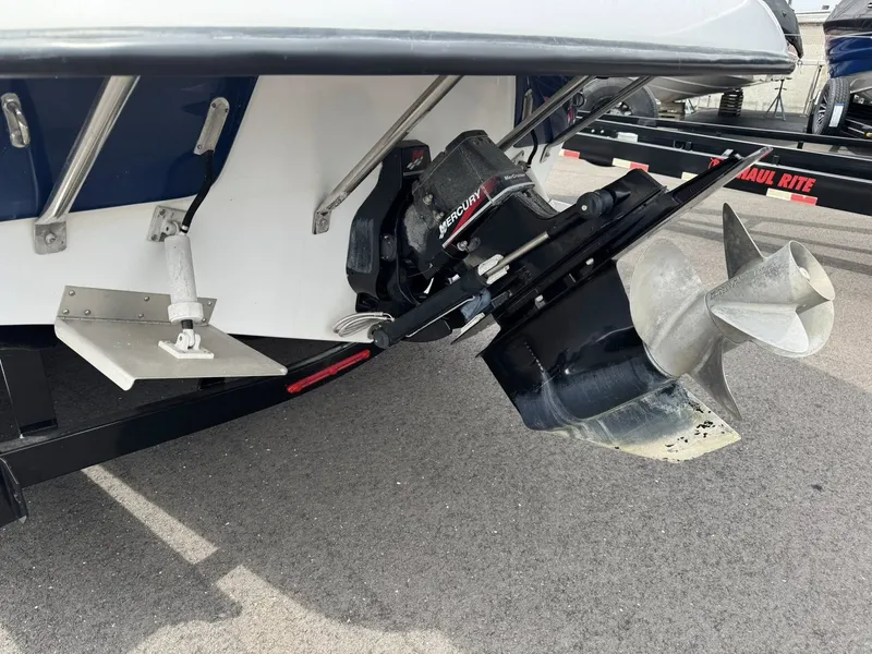 Slide: The Image of Rear view of 2003 Crownline 270 BR with Mercury drive. - 9