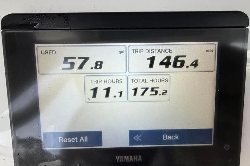 Slide: The Image of Yamaha display showing fuel usage, trip distance, and hours for 2023 Sea Hunt Ultra 255 SE. - 22