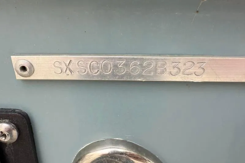 Slide: The Image of 2023 Sea Hunt Ultra 255 SE boat identification plate with serial number SXSC0362B323. - 39