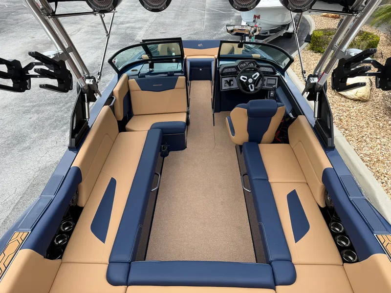 Slide: The Image of Interior of a 2022 MasterCraft NXT24 boat, luxurious seating and modern design. - 10