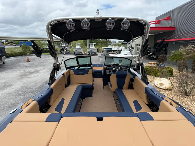 Slide: The Image of Interior view of a 2022 MasterCraft NXT24 boat with luxurious seating. - 9