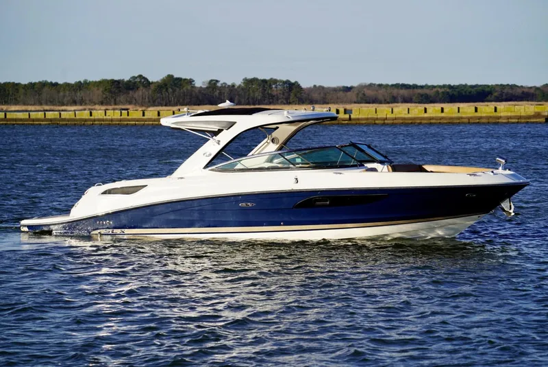 The Image of 2014 Sea Ray SLX 350 boat on calm water. - 0