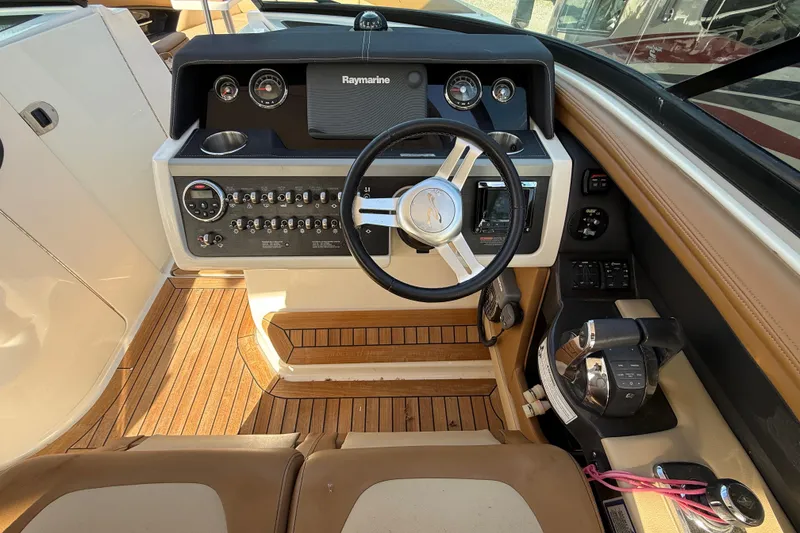 Slide: The Image of Luxurious 2014 Sea Ray SLX 350 boat interior with spacious seating and elegant design. - 10