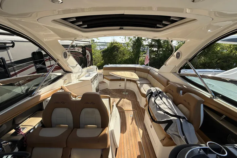 Slide: The Image of Luxurious 2014 Sea Ray SLX 350 boat interior with spacious seating and elegant design. - 34