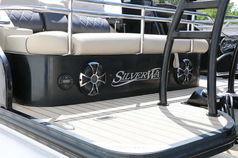 Slide: The Image of 2021 Silver Wave 2410 SW5 JS boat interior with seating and audio system. - 10