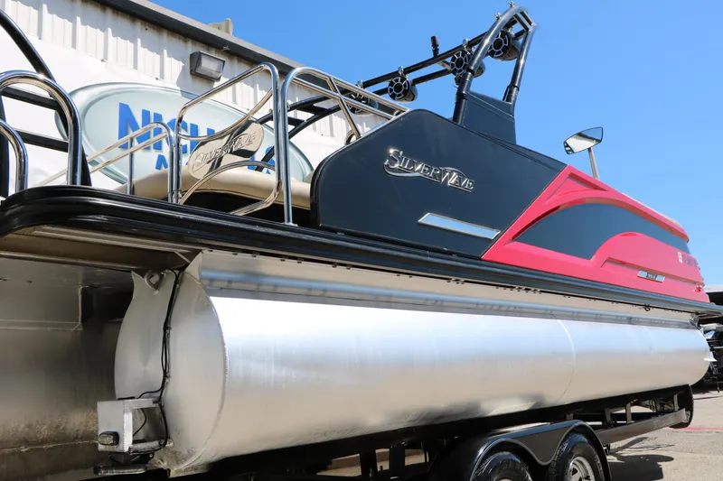 Slide: The Image of 2021 Silver Wave 2410 SW5 JS pontoon boat with sleek design and vibrant accents. - 12