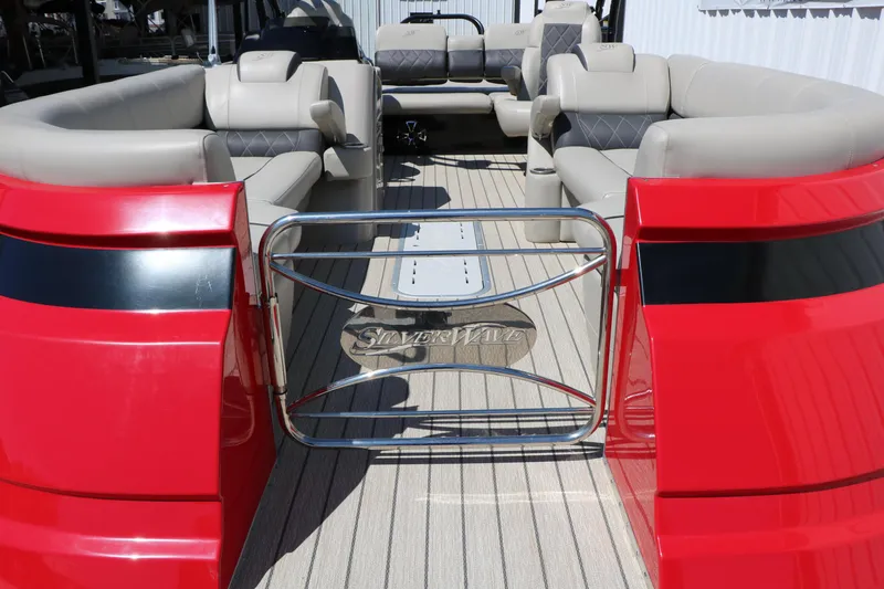 Slide: The Image of Luxurious 2021 Silver Wave 2410 SW5 JS pontoon boat with plush seating and sleek red accents. - 18