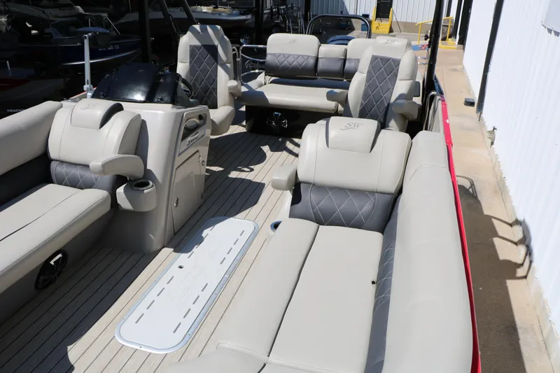 Slide: The Image of Interior of 2021 Silver Wave 2410 SW5 JS pontoon boat with luxurious seating. - 21