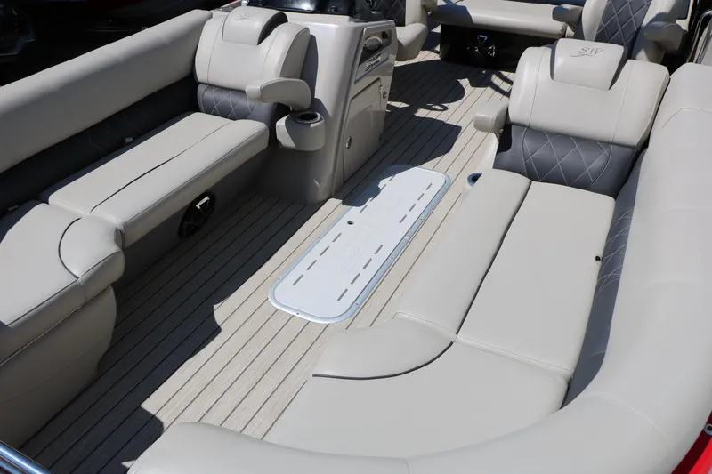 Slide: The Image of Luxurious interior of 2021 Silver Wave 2410 SW5 JS pontoon boat with plush seating. - 23
